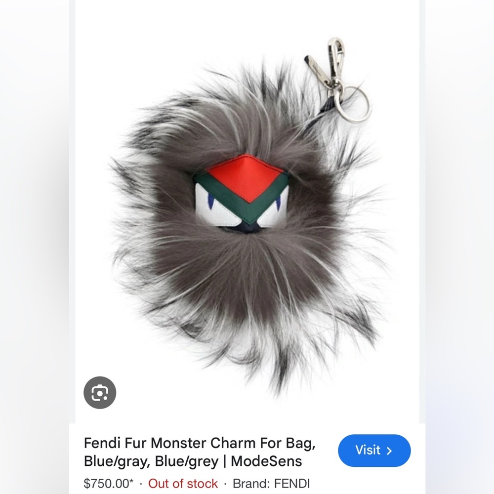 Gray fox Fur fendi monster Keychain bag charm with Red, blue and Green Accent